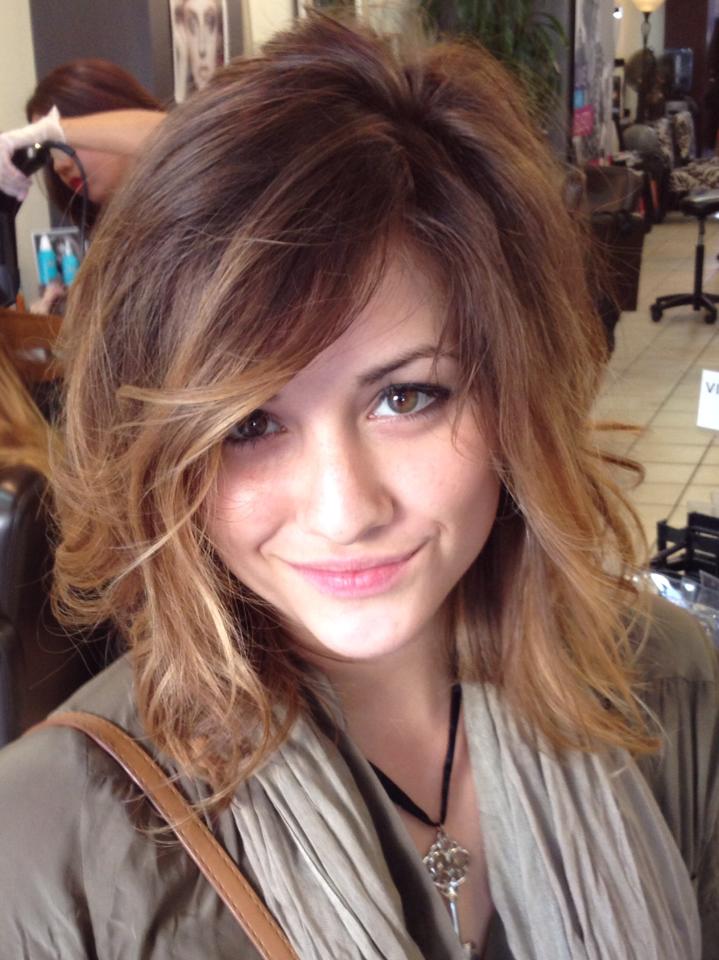 woman smiling in the salon with light brown hair