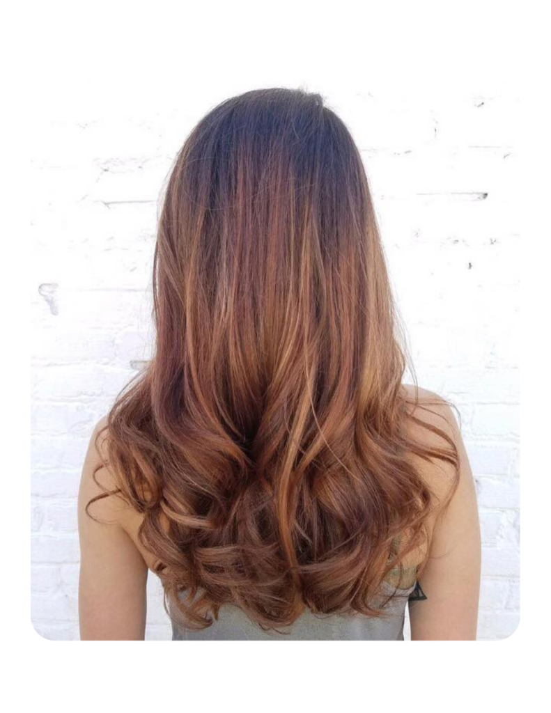 woman with long curled brown hair